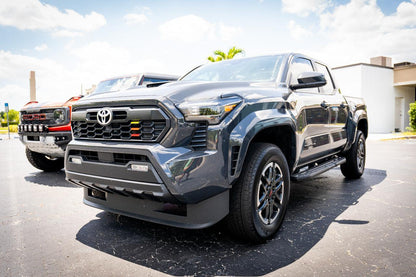 TRD Style Heritage Grille Tri Bar Overlays for 2024+ Toyota Tacoma, vinyl exterior accessory by StickerFab, shown on vehicle front grill.