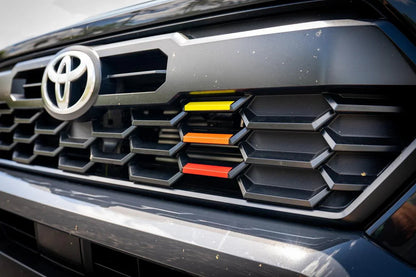 TRD Style Heritage Grille Tri Bar Overlays for 2024+ Toyota Tacoma, vinyl exterior overlays with a sleek tri-bar design.