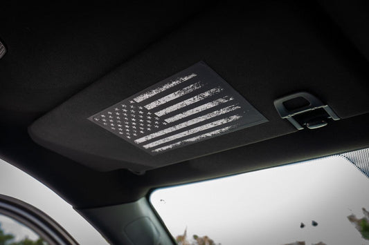 Sun visor airbag label overlay with distressed American flag design for 2024+ Toyota Tacoma interior, vinyl sticker by StickerFab.