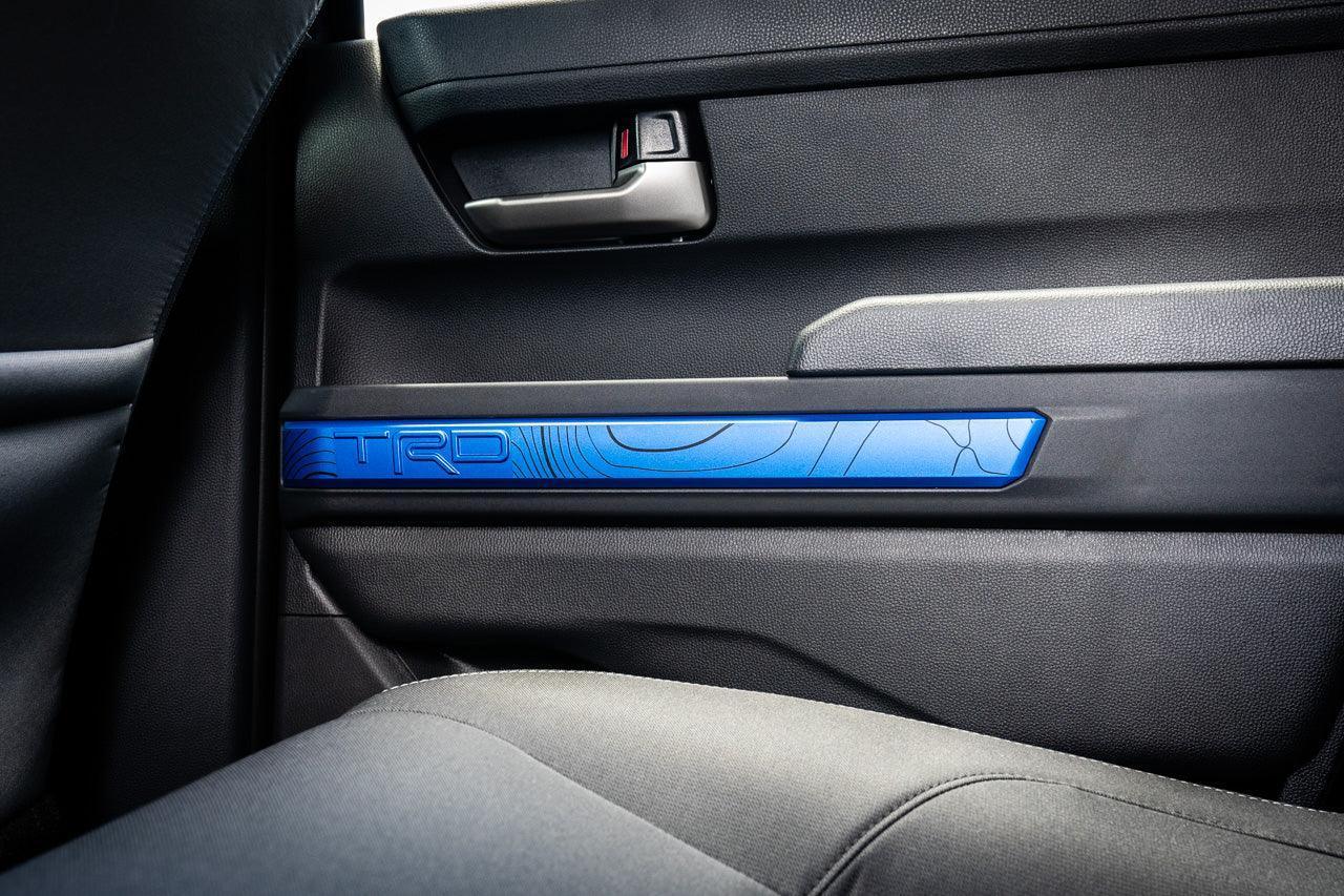 TRD Door Topographic Map Overlays for 2024+ Tacoma, vinyl interior car decal by StickerFab, showing detailed map design.