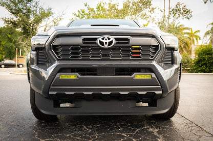 Vinyl fog light overlays for 2024+ Toyota Tacoma, exterior accessory by StickerFab, shown installed on vehicle.