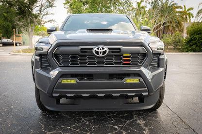 Vinyl fog light overlays for 2024+ Toyota Tacoma, exterior accessory by StickerFab, shown installed on vehicle.