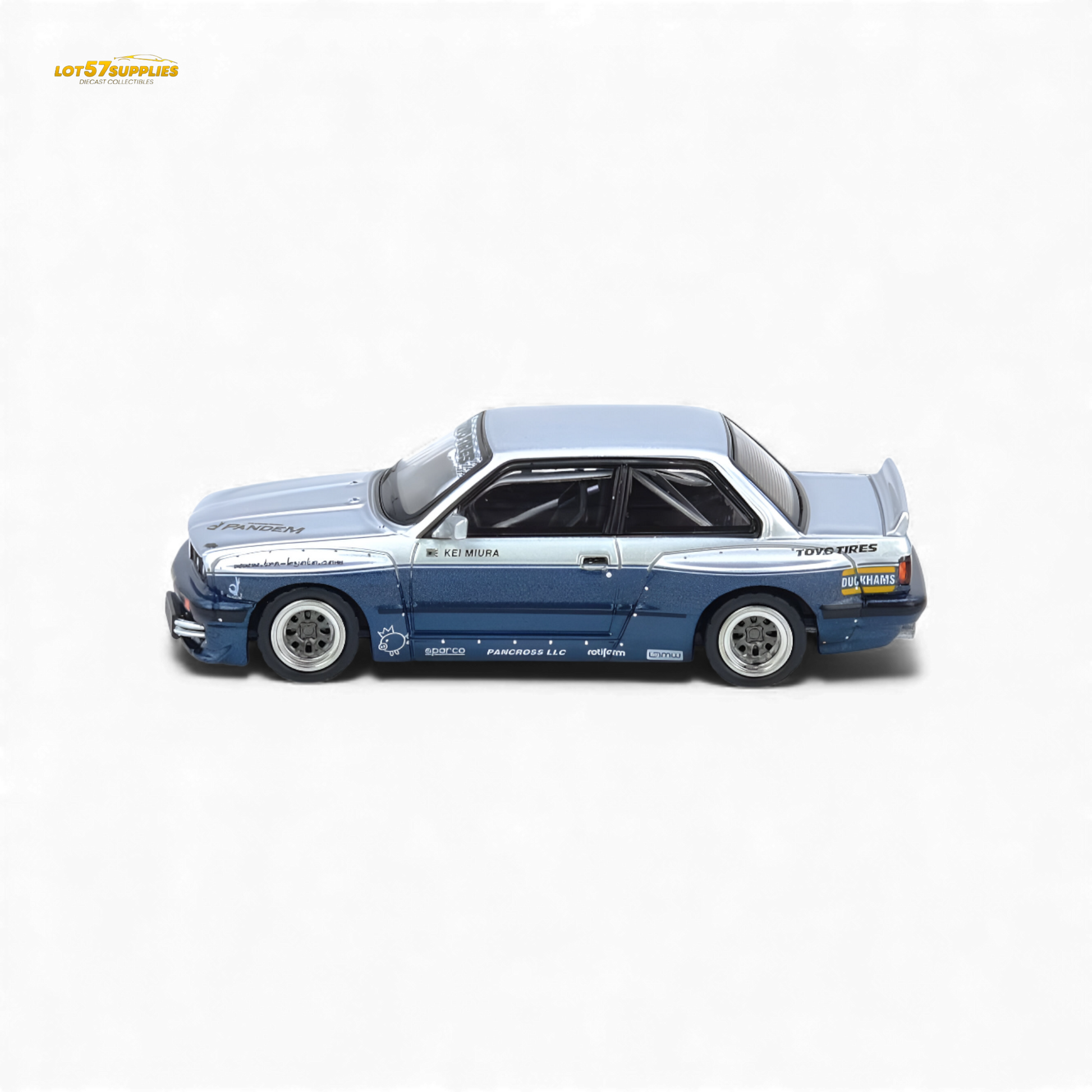 Silver and blue INNO64 Pandem E30 M3 BMW diecast model car, detailed 1:64 scale replica with realistic features.