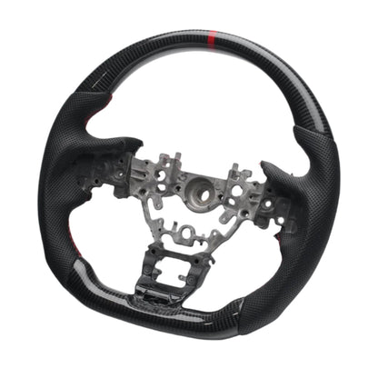 Red JDMuscle Carbon-Lite Series steering wheel for 2022-2025 WRX, shown with close-up of textured grip and branding details.
