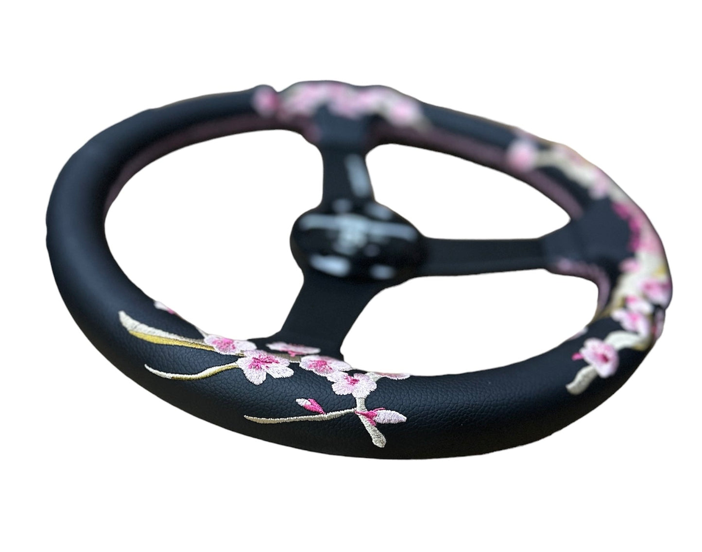 Speedzone Performance LLC SPDZ1 Sakura steering wheel, full view showing ergonomic grip and stylish design for racing or driving.