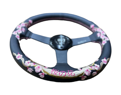 Speedzone Performance LLC SPDZ1 Sakura steering wheel, full view showing black and red design with textured grip for racing cars.