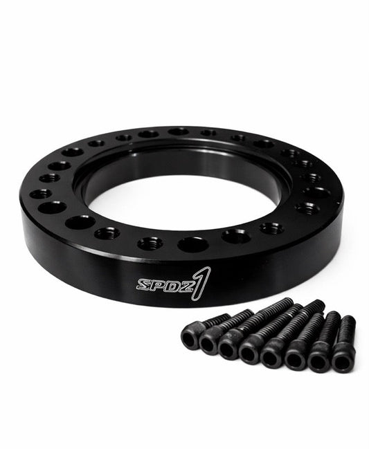 SPD Z1 10mm aluminum steering wheel hub spacer adapter from Speedzone Performance LLC, showing the full spacer and hardware.