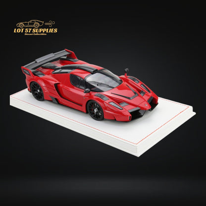 Red Ferrari Enzo Gemballa MIG U1 diecast model in 1:18 scale, detailed silver accents, displayed on a plain background.