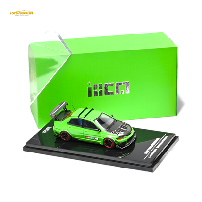 Green Mitsubishi Lancer Evo IX diecast model in 1:64 scale by Lot57Supplies, detailed green Mitsubishi car with realistic features.