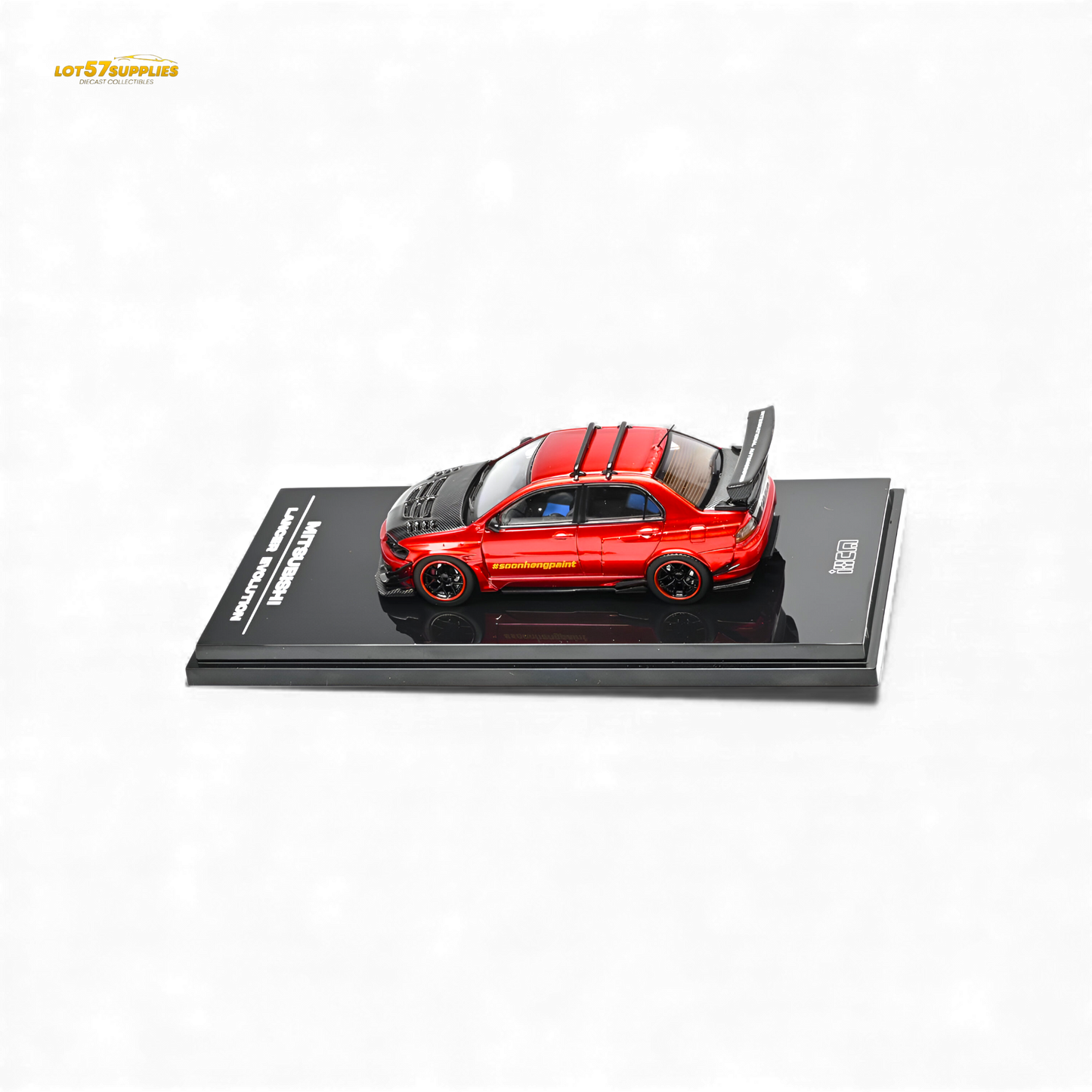 Metallic red Mitsubishi Lancer Evo IX diecast model in 1:64 scale from Lot57Supplies Diecast Shop, shown in close-up detail.