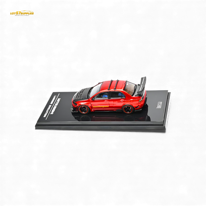 Metallic red Mitsubishi Lancer Evo IX diecast model in 1:64 scale from Lot57Supplies Diecast Shop, shown in close-up detail.