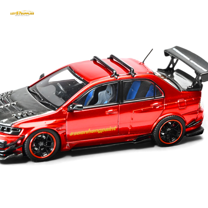 Metallic red Mitsubishi Lancer Evo IX diecast model car, 1:64 scale from Lot57Supplies Diecast Shop, detailed and realistic.