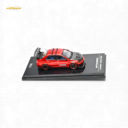 Metallic red Mitsubishi Lancer Evo IX diecast model in 1:64 scale, showcasing detailed design and vibrant color.