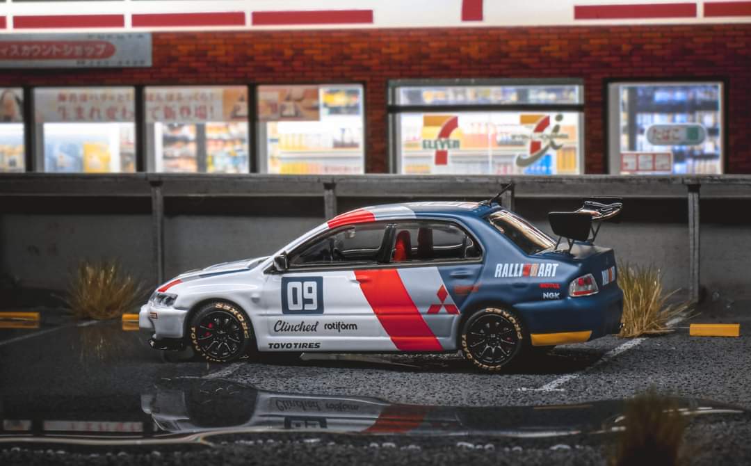 Diecast Speed GT Mitsubishi Evolution 9 Ralliart model car in 1:64 scale, detailed miniature from Lot57Supplies Diecast Shop.