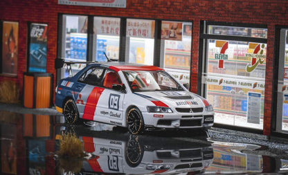 Diecast Mitsubishi Evolution 9 Ralliart model car in 1:64 scale from Speed GT, detailed red and white design, collectible toy.