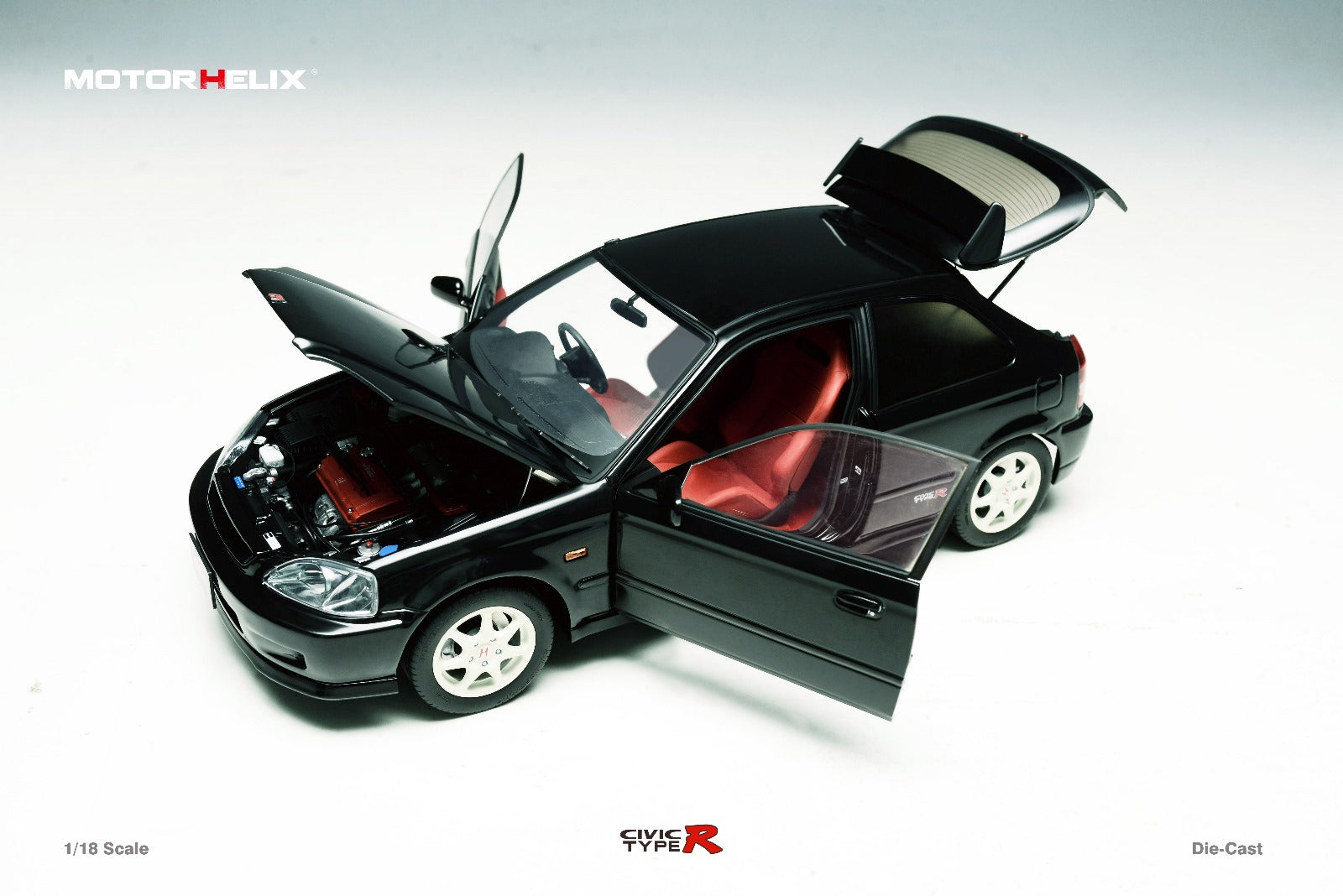 Black Honda Civic Type-R EK9 diecast model in 1:18 scale by Lot57Supplies Diecast Shop, detailed view of the miniature car.