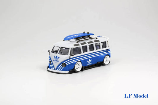 Blue and white LF Model Volkswagen T1 Kombi diecast car with surfboards, 1:64 scale, displayed on a neutral background.