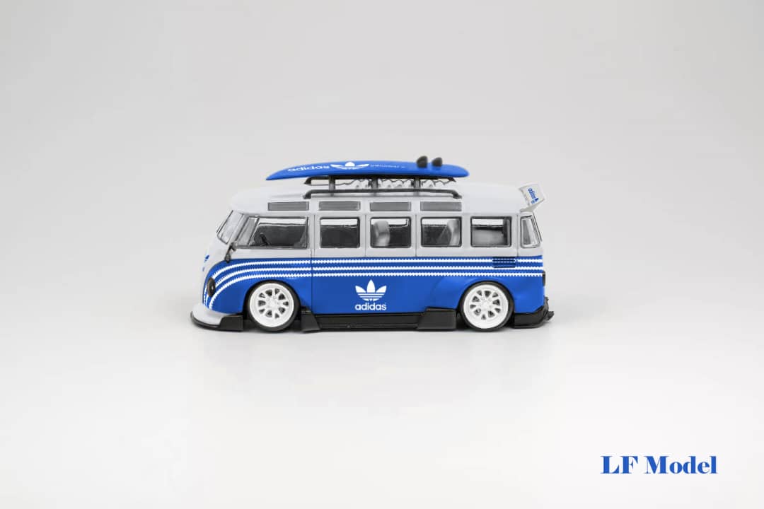 Blue and white LF Model Volkswagen T1 Kombi with surfboards, 1:64 scale diecast vehicle, detailed and vibrant.
