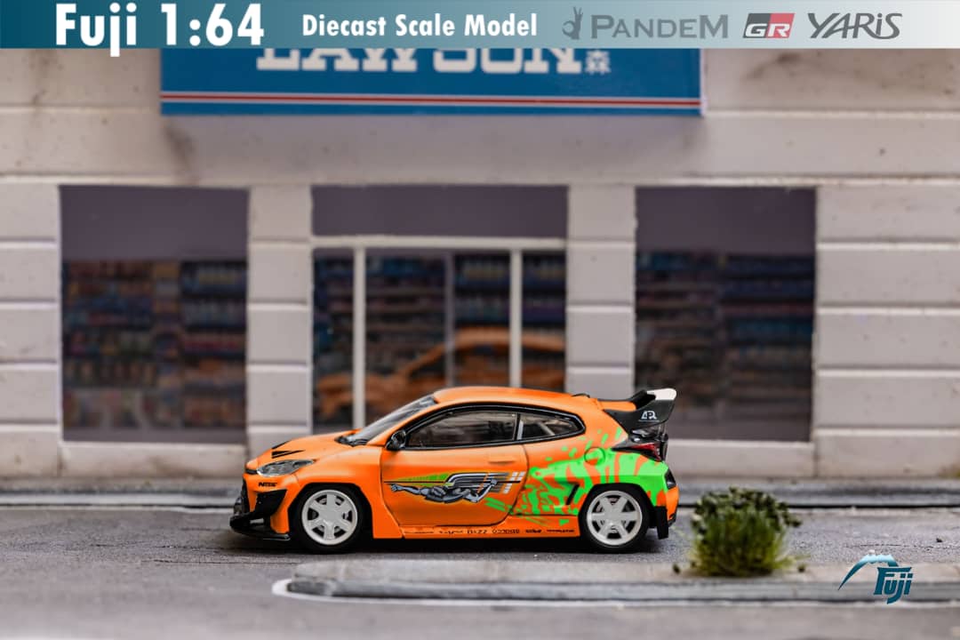 Diecast Toyota Yaris GR model car in Fast & Furious livery, 1:64 scale, featuring detailed race car design from Lot57Supplies.