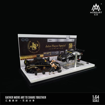 MoreArt 1:64 scale diecast model of a JPS livery racing car from Lot57Supplies Diecast Shop, detailed automotive repair workshop design.