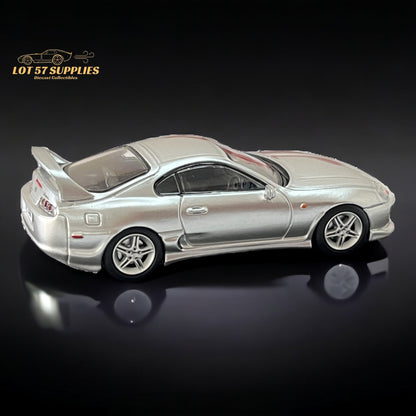 Silver 1:64 scale Toyota Supra JZA80Z diecast model by Lot57Supplies, detailed close-up of the toy car's exterior.