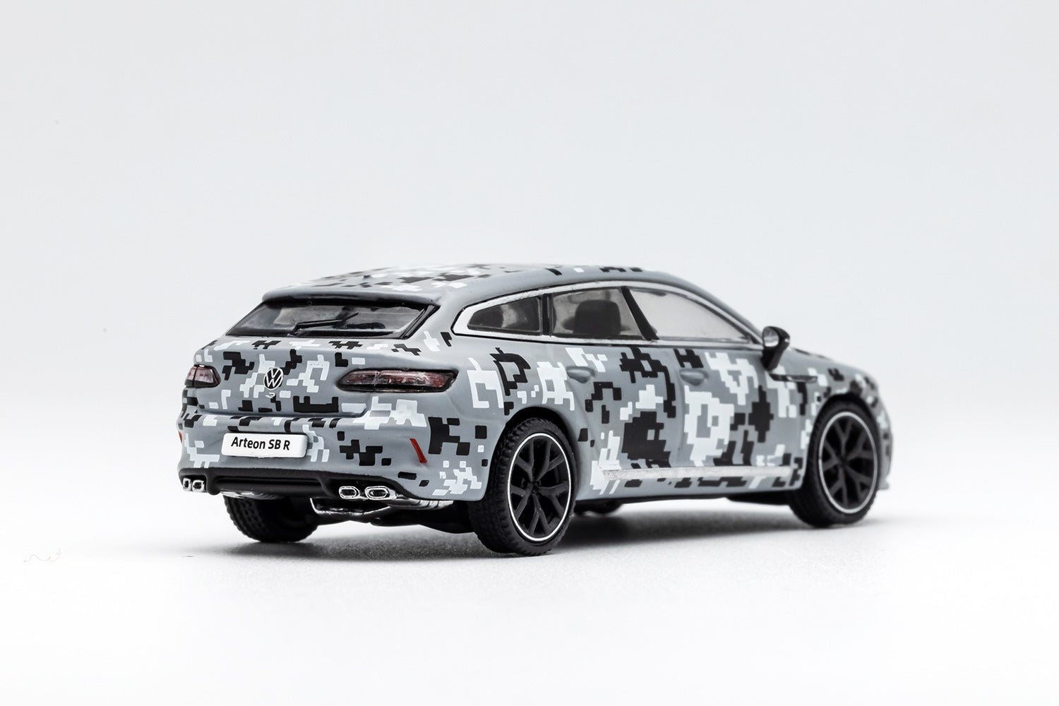 Grey Volkswagen Arteon R diecast model in urban camouflage design, 1:64 scale, detailed miniature vehicle by Lot57Supplies.