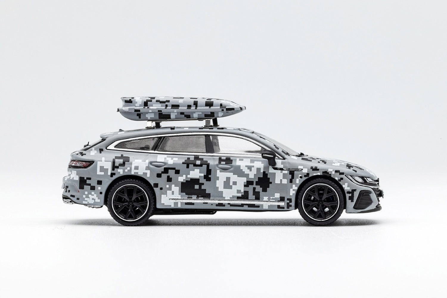 Gray Volkswagen Arteon R diecast model in urban camouflage pattern, 1:64 scale, detailed miniature from Lot57Supplies Diecast Shop.