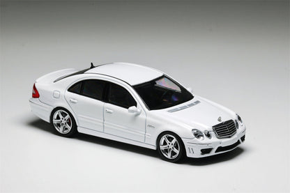 White Mercedes-Benz E63 AMG W211 diecast model car by Lot57Supplies, detailed miniature replica, 1:64 scale.