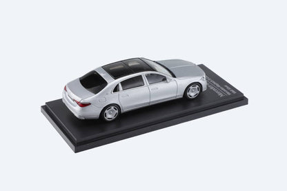 Matte silver 1:64 scale Mercedes-Benz Maybach W223 diecast model by Lot57Supplies Diecast Shop, showing detailed exterior design.