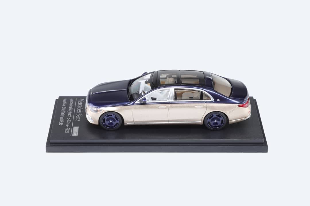 Blue-gold Mercedes-Benz Maybach W223 diecast model in 1:64 scale by Lot57Supplies Diecast Shop, detailed and collectible.
