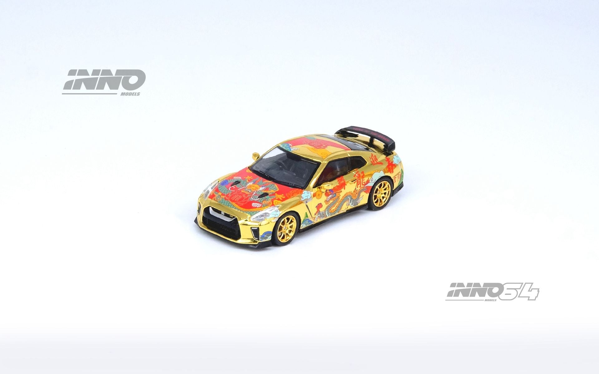 Detailed image of a 1:64 scale Inno64 Nissan Skyline GT-R R35 Year of the Dragon Special Edition diecast model.