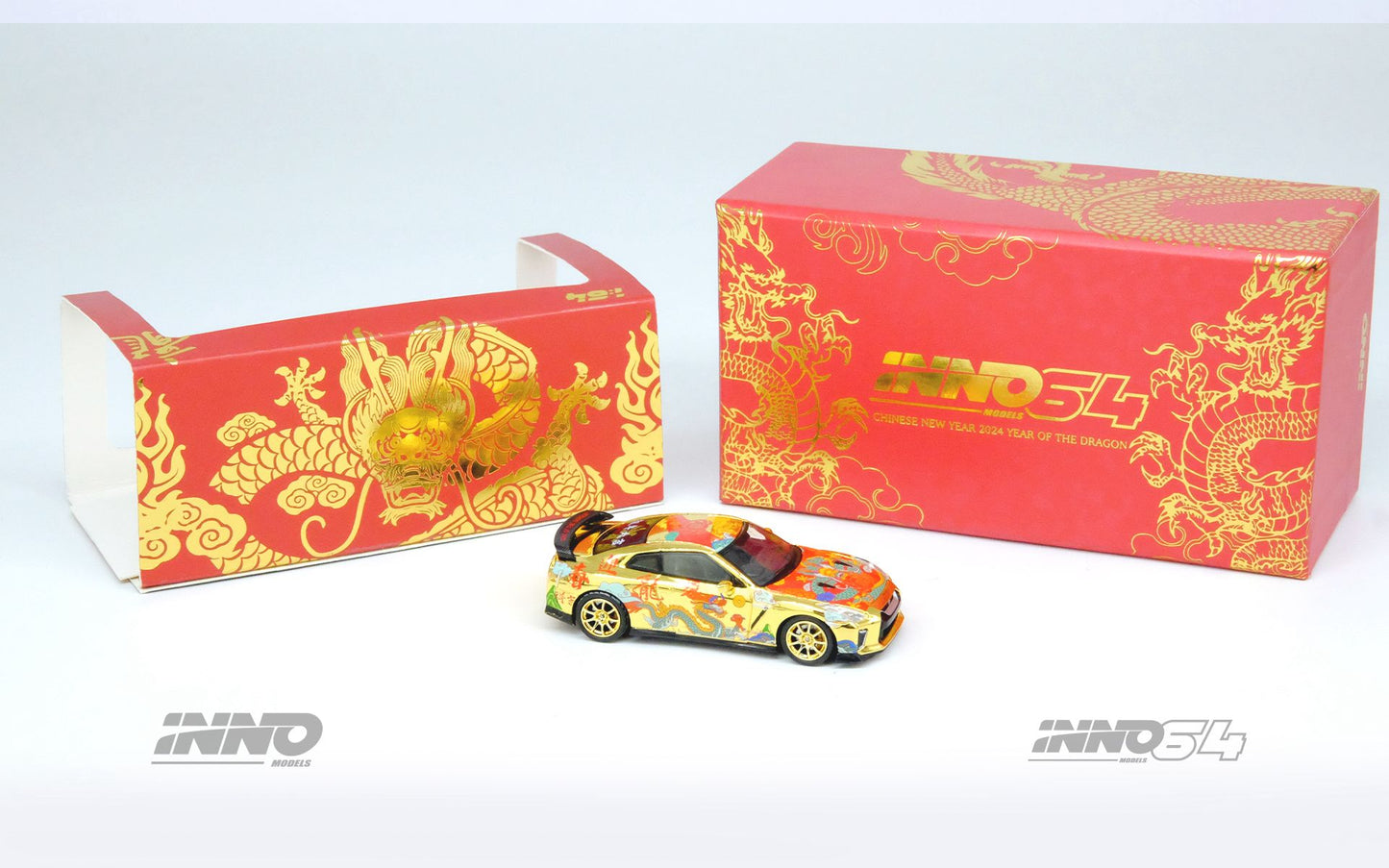 Diecast model of Inno64 Nissan Skyline GT-R R35 Year Of The Dragon Special Edition in 1:64 scale, featuring detailed design and vibrant colors.