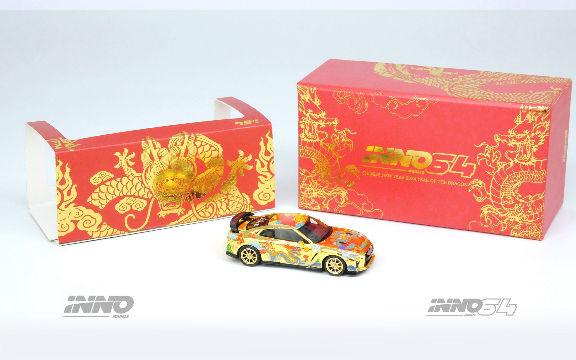Diecast model of Inno64 Nissan Skyline GT-R R35 Year Of The Dragon Special Edition in 1:64 scale, featuring detailed design and vibrant colors.