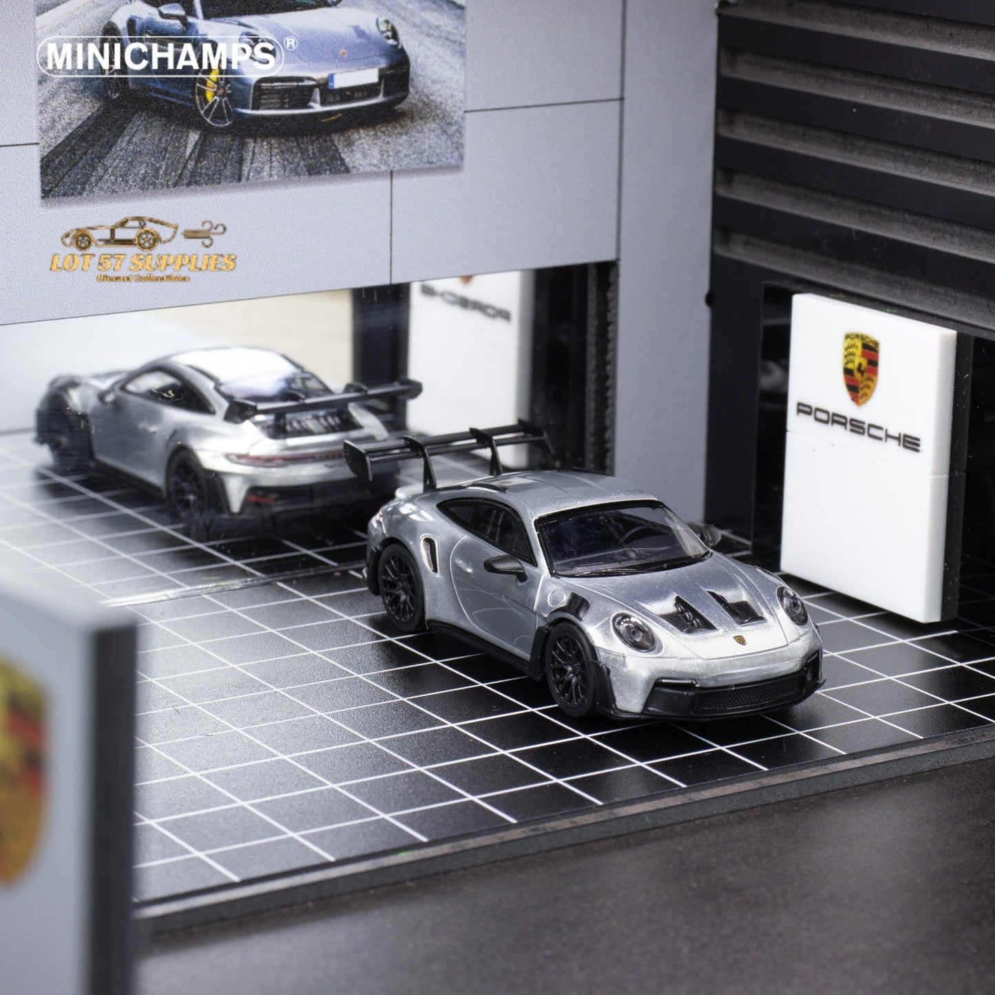 Silver Porsche 911 GT3 RS diecast model in 1:64 scale, detailed miniature car by Minichamps.