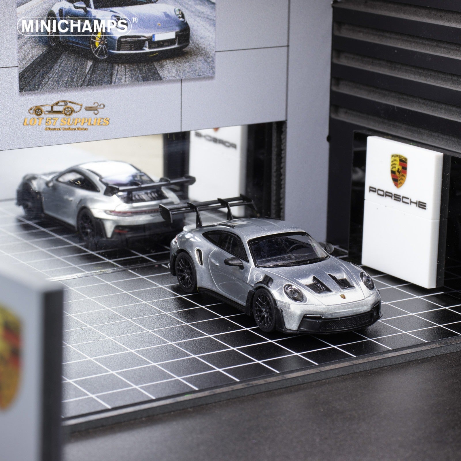 Silver Porsche 911 GT3 RS diecast model in 1:64 scale, detailed miniature car by Minichamps.