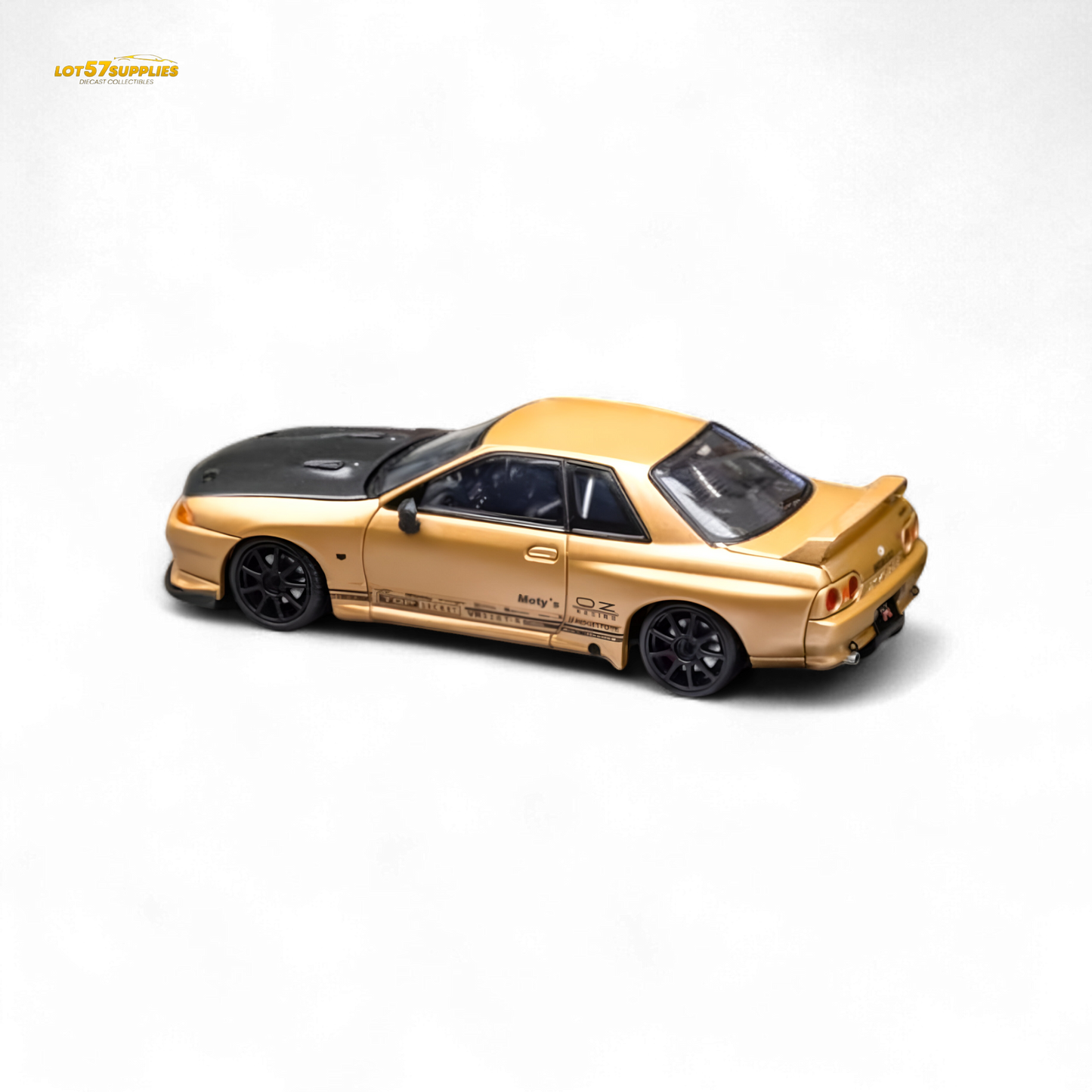 Gold Focal Horizon Nissan Skyline GT-R R32 diecast model by Lot57Supplies, detailed 1:64 scale collectible car.