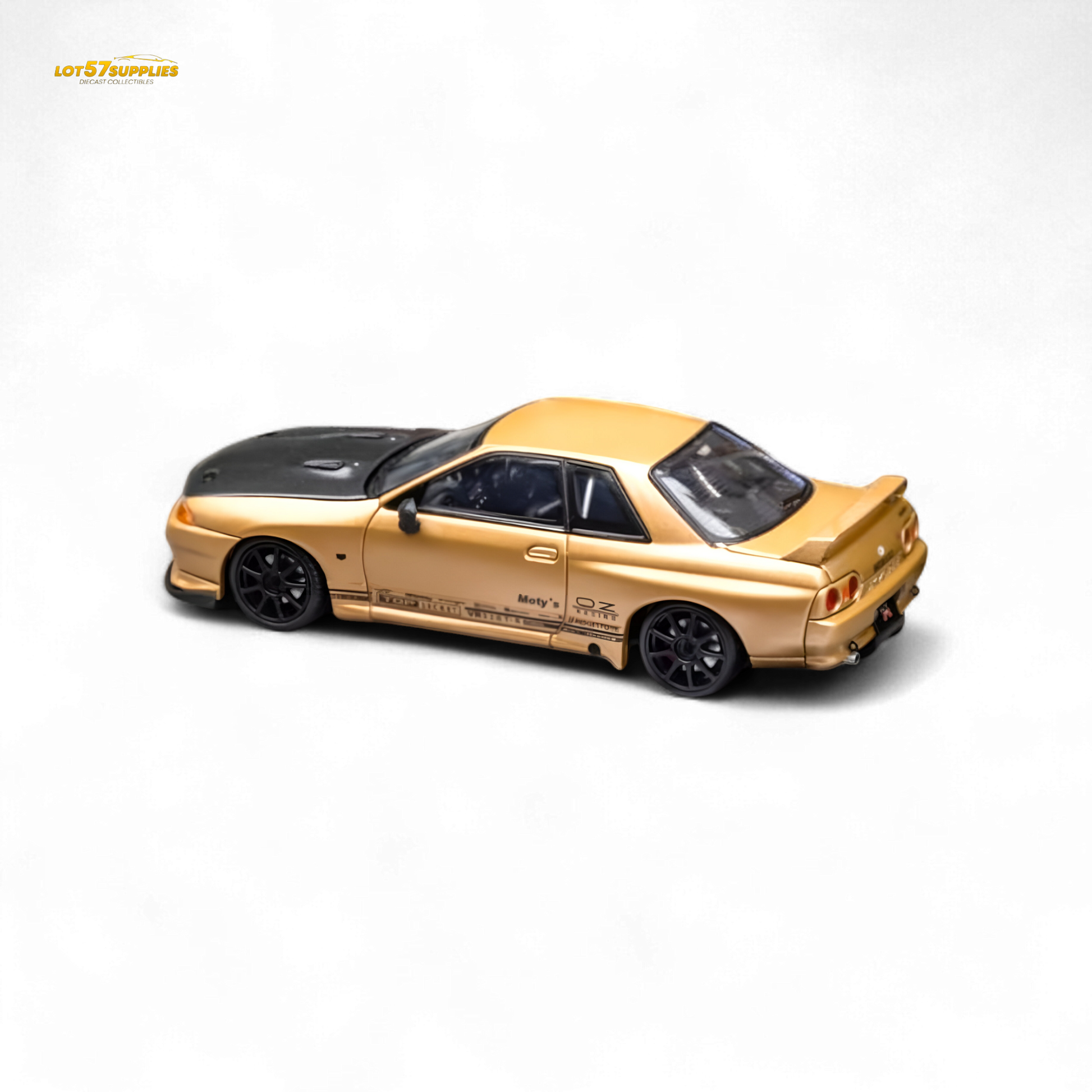 Gold Focal Horizon Nissan Skyline GT-R R32 diecast model by Lot57Supplies, detailed 1:64 scale collectible car.