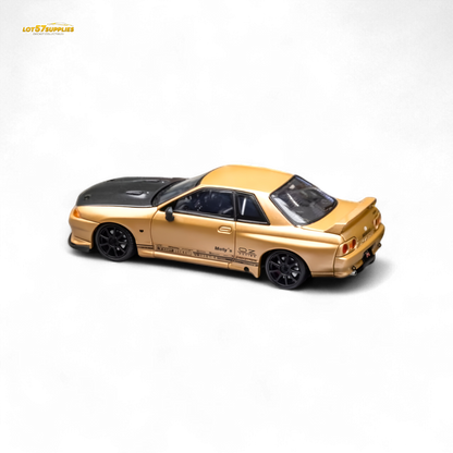 Gold Focal Horizon Nissan Skyline GT-R R32 diecast model by Lot57Supplies, detailed 1:64 scale collectible car.