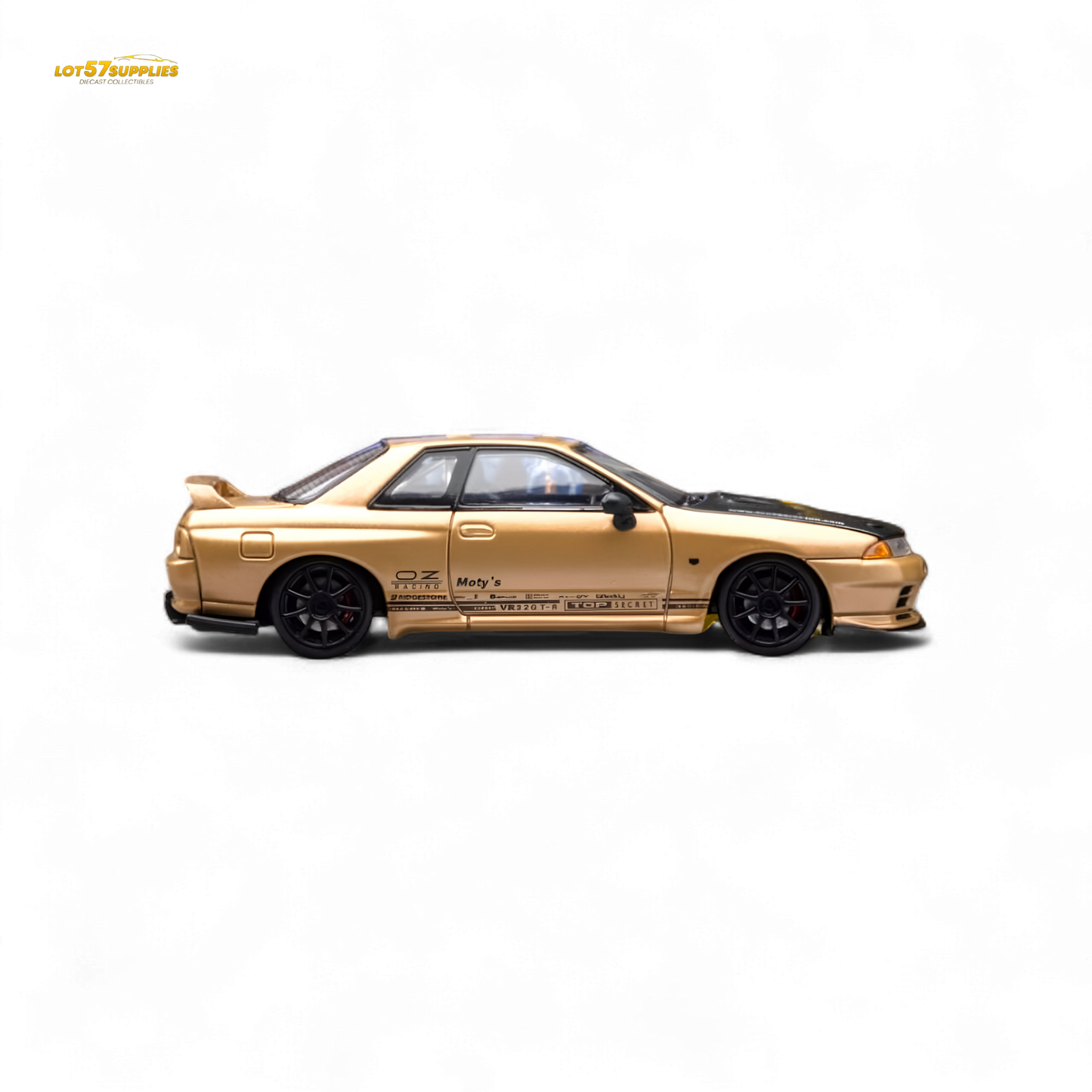 Gold 1:64 scale Focal Horizon Nissan Skyline GT-R R32 diecast model, detailed view from Lot57Supplies Diecast Shop.