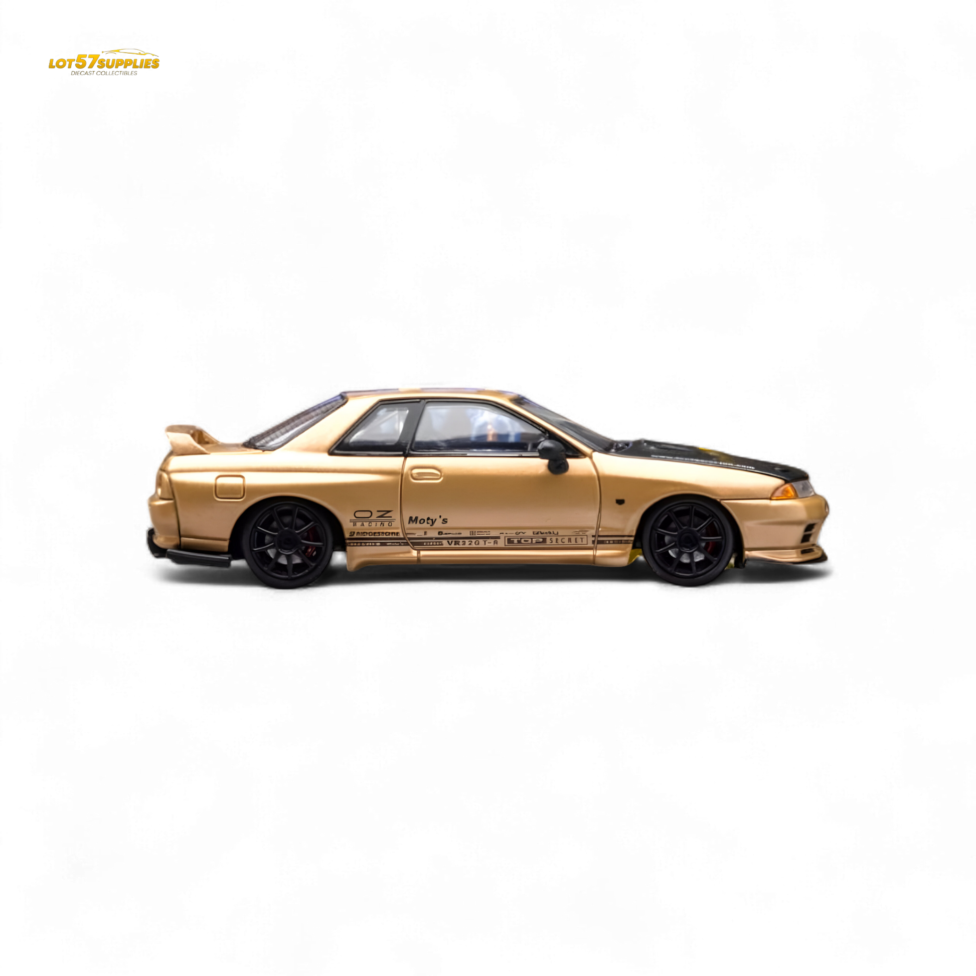Gold 1:64 scale Focal Horizon Nissan Skyline GT-R R32 diecast model, detailed view from Lot57Supplies Diecast Shop.