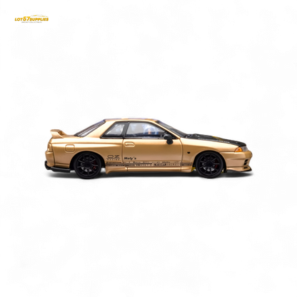 Gold 1:64 scale Focal Horizon Nissan Skyline GT-R R32 diecast model, detailed view from Lot57Supplies Diecast Shop.