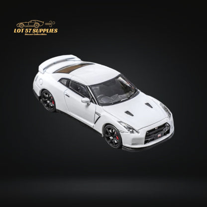 White Nissan Skyline GT-R R35 diecast model by Lot57Supplies, detailed 1:64 scale car on a neutral background.
