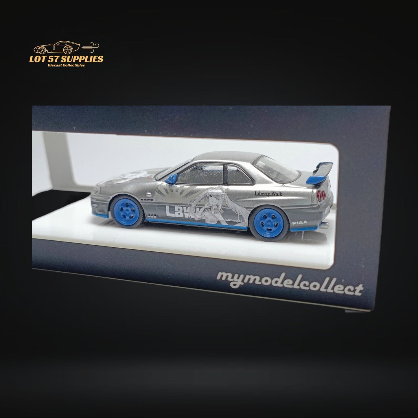 Silver Nissan Skyline R34 25GT Turbo diecast model with Queen Livery in 1:64 scale from Lot57Supplies Diecast Shop