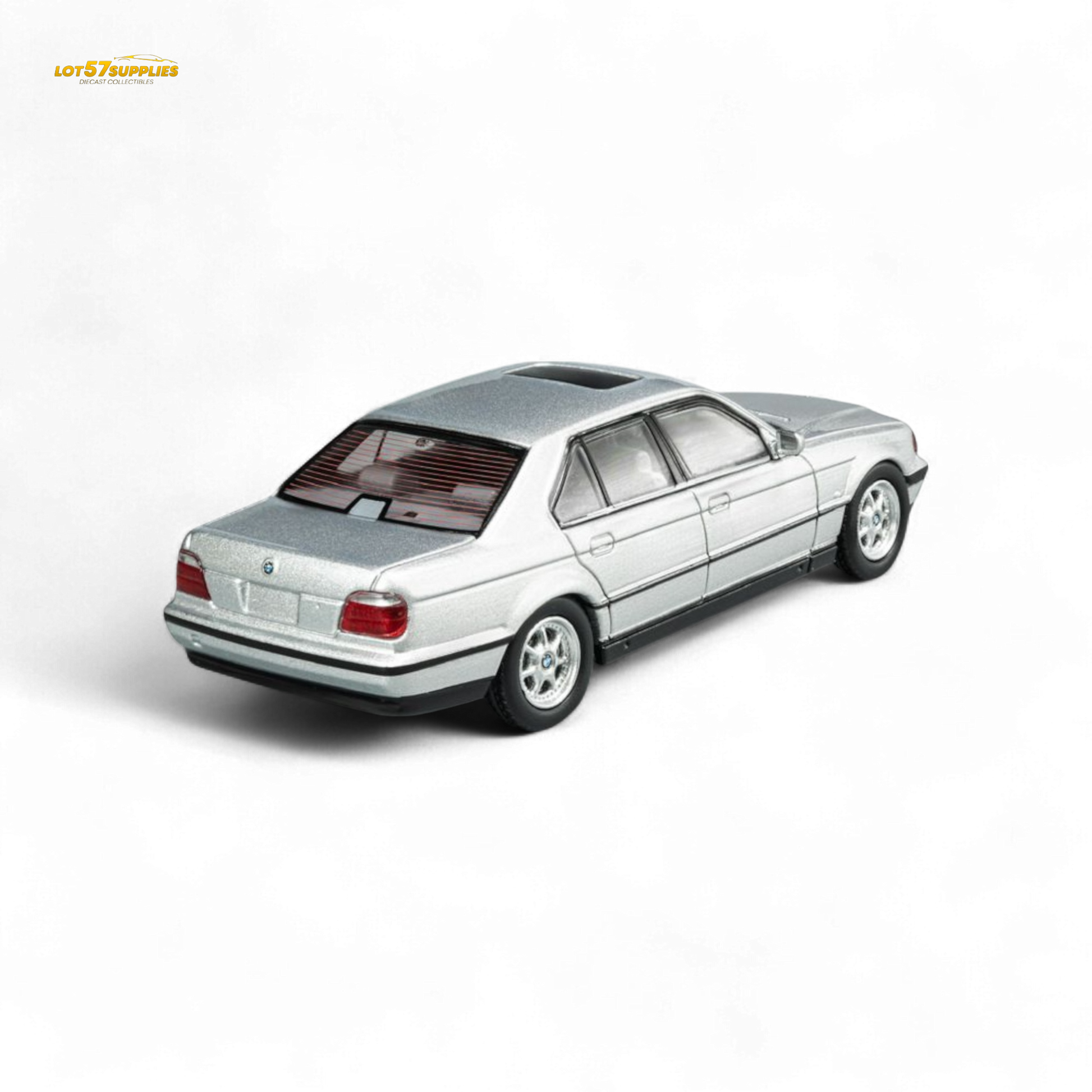 Silver BMW E38 740iL 7-Series diecast model by Lot57Supplies, detailed miniature car in 1:64 scale.