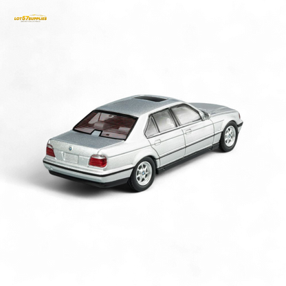 Silver BMW E38 740iL 7-Series diecast model by Lot57Supplies, detailed miniature car in 1:64 scale.