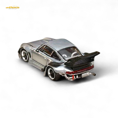 Diecast Porsche RWB 993 street weapon model with raw varnish color and high wing, detailed 1:64 scale by Lot57Supplies.