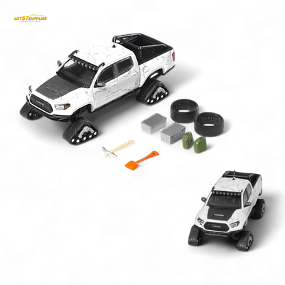 White Toyota Tacoma diecast model in snow version, 1:64 scale from Lot57Supplies Diecast Shop, detailed miniature vehicle.