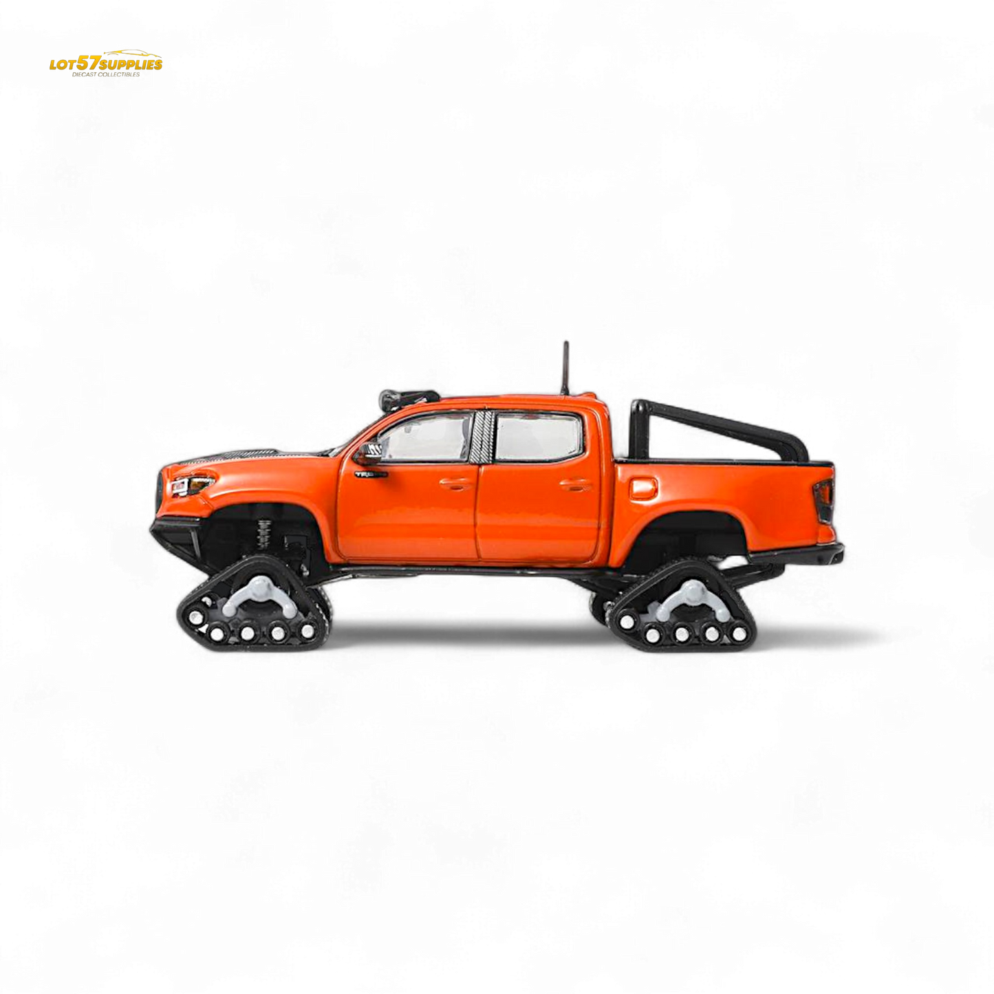 Toyota Tacoma diecast model with orange-red GCD 3PMSF tires, detailed miniature vehicle for display or collection.