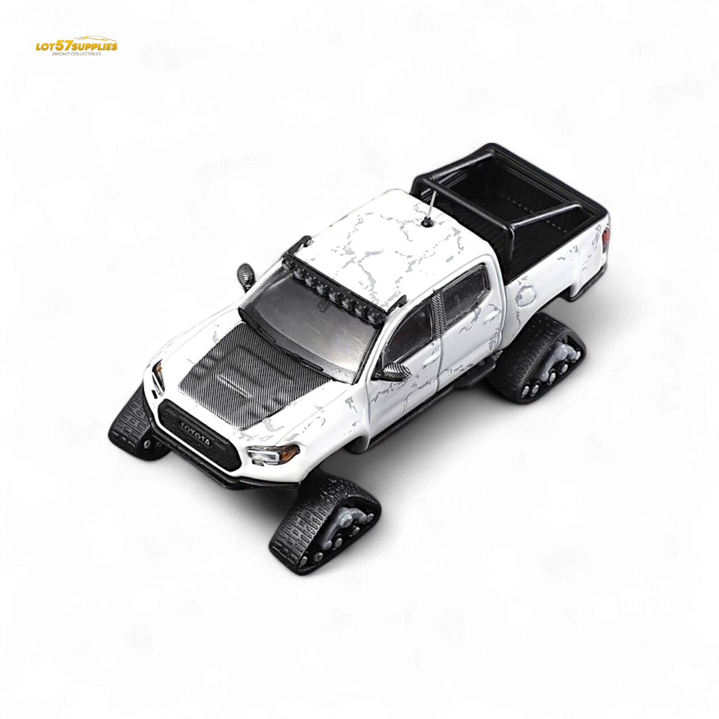 White 1:64 scale Toyota Tacoma snow version diecast model by Lot57Supplies Diecast Shop, detailed miniature vehicle.