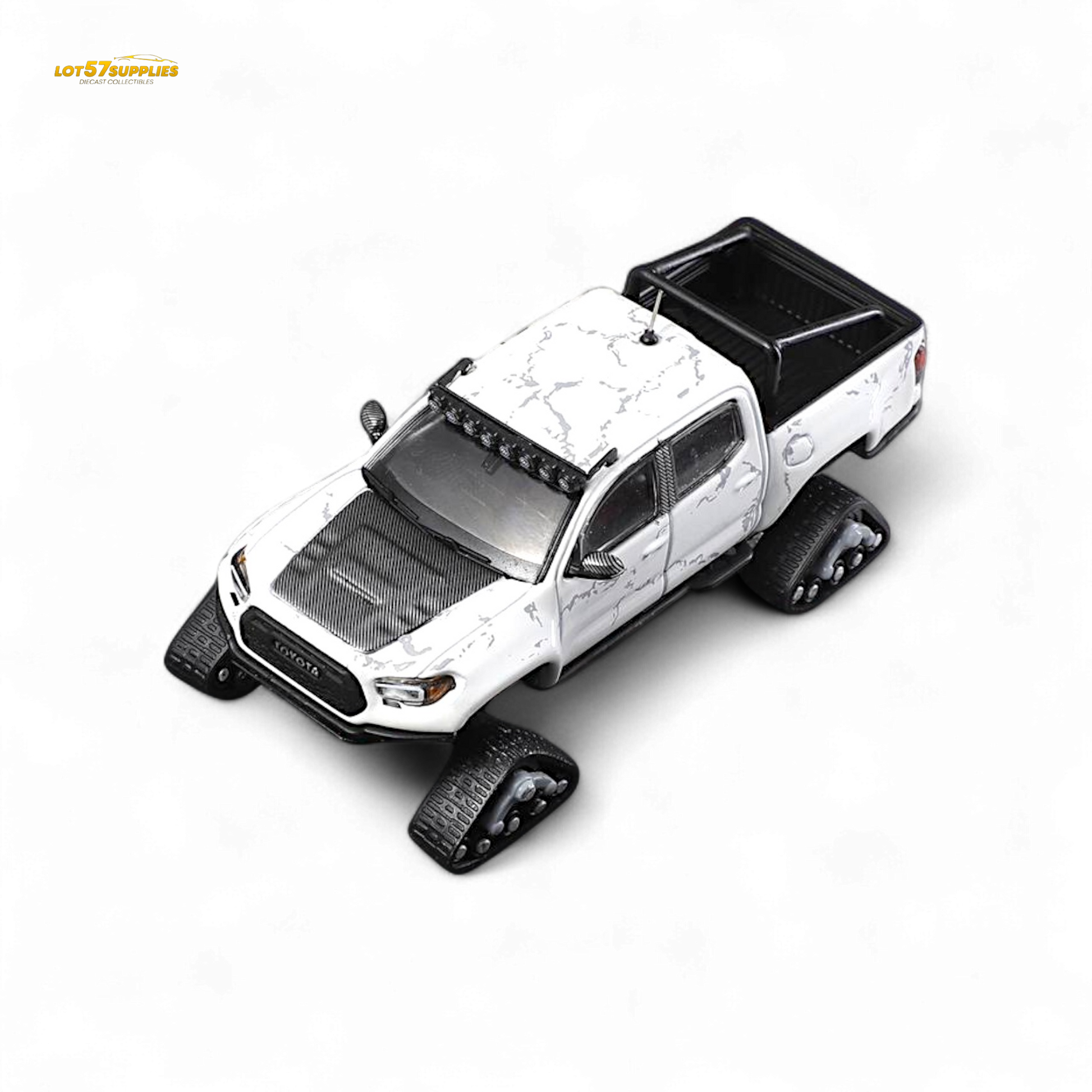 White 1:64 scale Toyota Tacoma snow version diecast model by Lot57Supplies Diecast Shop, detailed miniature vehicle.